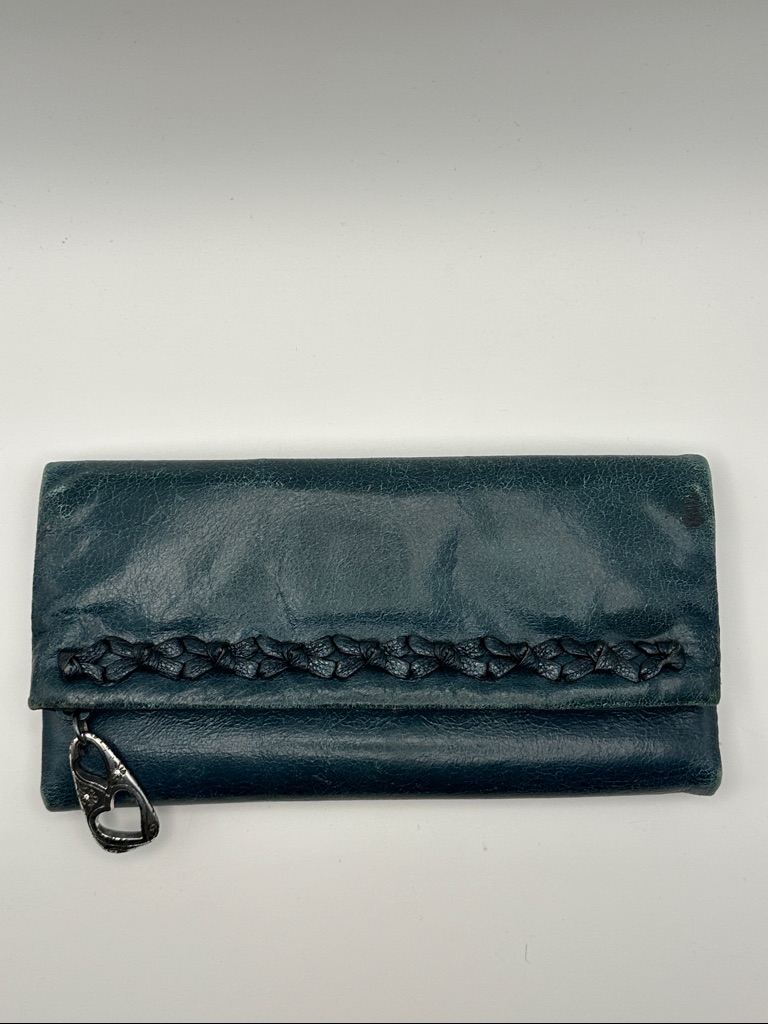 Brighton Teal Fold-Over Wallet With Braided Accent And Magnetic Closure.